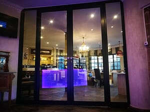 Double Hinged door For Shopfront with sidelight in Charcoal colour